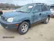 2002 Hyundai Santa Fe GLS with VIN KM8SC13D82U241929, listed as a IAAI auction lot 41709874 with 153,791 mi miles and . Bid and sale history available at DreamBid. Image 2.