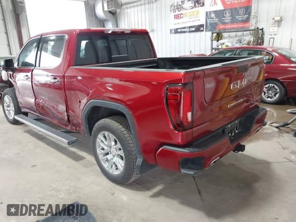2023 GMC Sierra 1500 Denali with VIN 1GTUUGEL6PZ280062, listed as a IAAI auction lot 42996820 with 29,215 mi miles and . Bid and sale history available at DreamBid. Image 3.
