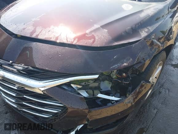 2020 Chevrolet Malibu LS z VIN 1G1ZC5ST5LF106330, wystawiony jako IAAI lot #43287810 z przebiegiem 144 130 mil mil oraz . Historia ofert i sprzedaży dostępna na DreamBid. Obrazek 6.