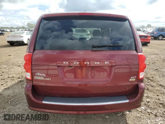2017 Dodge Grand Caravan SXT with VIN 2C4RDGCG7HR791898, listed as a Copart auction lot 81711215 with 97,311 mi miles and Salvage title. Bid and sale history available at DreamBid. Image 6.