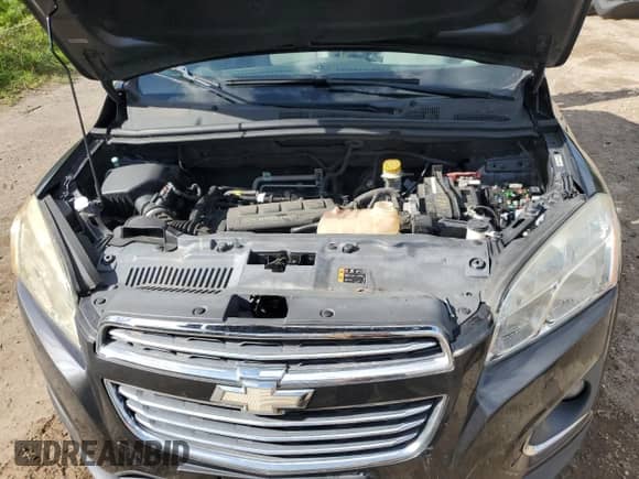 2016 Chevrolet Trax LTZ z VIN 3GNCJMSB1GL180772, wystawiony jako Copart lot #71200815 z przebiegiem 155 373 mil mil oraz Czysty tytuł • Clean title. Historia ofert i sprzedaży dostępna na DreamBid. Obrazek 12.