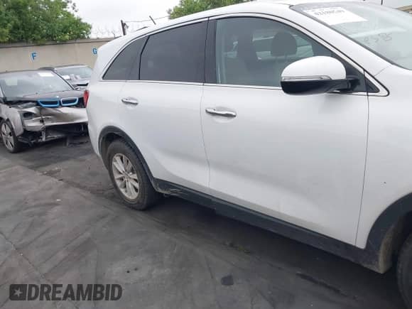 2019 Kia Sorento L with VIN 5XYPG4A3XKG536087, listed as a IAAI auction lot 42180549 with 103,758 mi miles and . Bid and sale history available at DreamBid. Image 13.