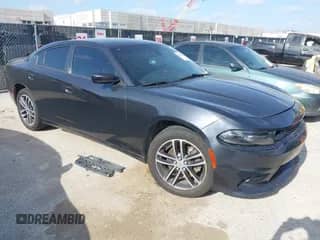 2019 Dodge Charger SXT with VIN 2C3CDXJG8KH653863, listed as a IAAI auction lot 42559015 with 117,619 mi miles and . Bid and sale history available at DreamBid. Image 1.
