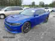 2018 Dodge Charger R/T z VIN 2C3CDXCTXJH221087, wystawiony jako IAAI lot #42283655 z przebiegiem 66 338 mil mil oraz . Historia ofert i sprzedaży dostępna na DreamBid. Obrazek 2.