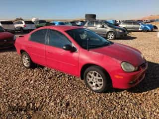 2002 Dodge Neon ES z VIN 1B3ES56C12D591211, wystawiony jako Copart lot #79938574 z przebiegiem 188 137 mil mil oraz Szkoda całkowita • Salvage title. Historia ofert i sprzedaży dostępna na DreamBid. Obrazek 4.