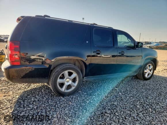 2011 Chevrolet Suburban LT with VIN 1GNSCJE00BR291796, listed as a Copart auction lot 64288365 with 300,451 mi miles and Clean title. Bid and sale history available at DreamBid. Image 3.