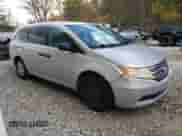 2012 Honda Odyssey LX with VIN 5FNRL5H22CB101919, listed as a Copart auction lot 82742425 with 157,279 mi miles and Clean title. Bid and sale history available at DreamBid. Image 4.