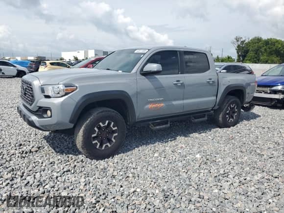 2021 Toyota Tacoma SR5 with VIN 3TMAZ5CN9MM148312, listed as a Copart auction lot 63611885 with 95,209 mi miles and Salvage title. Bid and sale history available at DreamBid. Image 1.