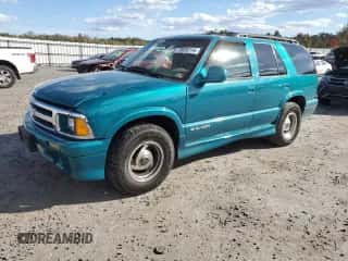1996 Chevrolet Blazer z VIN 1GNCS13W3T2166106, wystawiony jako Copart lot #73635714 z przebiegiem 162 767 mil mil oraz Czysty tytuł • Clean title. Historia ofert i sprzedaży dostępna na DreamBid. Obrazek 1.