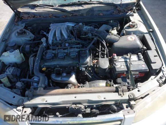 2001 Toyota Camry LE z VIN 4T1BF28K81U963484, wystawiony jako IAAI lot #42821173 z przebiegiem 166 275 mil mil oraz . Historia ofert i sprzedaży dostępna na DreamBid. Obrazek 10.