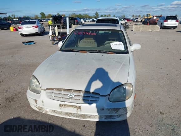 2001 Hyundai Sonata with VIN KMHWF25S41A403128, listed as a IAAI auction lot 43554850 with 212,602 mi miles and . Bid and sale history available at DreamBid. Image 6.