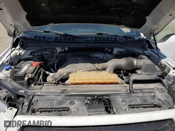 2016 Ford F-150 XLT with VIN 1FTFX1EG4GKF49765, listed as a Copart auction lot 54709385 with 126,054 mi miles and Salvage title. Bid and sale history available at DreamBid. Image 11.