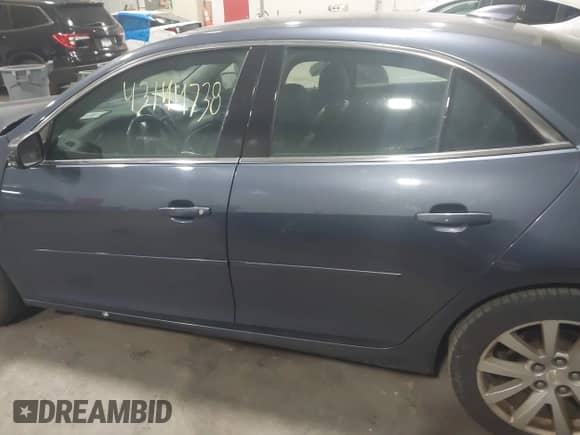 2015 Chevrolet Malibu LT with VIN 1G11D5SL2FF315314, listed as a IAAI auction lot 43144738 with 213,967 mi miles and . Bid and sale history available at DreamBid. Image 13.