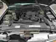 2001 Chevrolet Blazer LS z VIN 1GNCT18W61K185977, wystawiony jako Copart lot #57461385 z przebiegiem 114 357 mil mil oraz Szkoda całkowita • Salvage title. Historia ofert i sprzedaży dostępna na DreamBid. Obrazek 11.