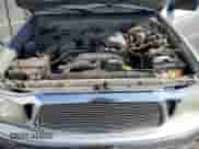 2001 Toyota Tacoma PreRunner с VIN 5TEGN92N71Z814712, выставлен на аукционе Copart как лот 65134275 с пробегом 143 238 миль миль и Списание • Salvage title. История ставок и продаж доступна на DreamBid. Изображение 11.