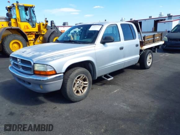 2003 Dodge Dakota SLT z VIN 1D7HL48N33S295059, wystawiony jako IAAI lot #42085612 z przebiegiem 176 934 mil mil oraz . Historia ofert i sprzedaży dostępna na DreamBid. Obrazek 2.