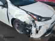 2019 Toyota Prius L Eco with VIN JTDKARFU7K3093038, listed as a IAAI auction lot 41768066 with 124,495 mi miles and . Bid and sale history available at DreamBid. Image 6.