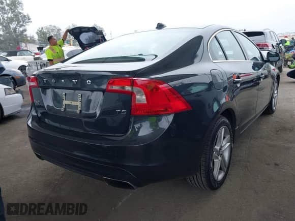 2015 Volvo S60 T5 Drive-E Premier with VIN YV126MFB0F2301169, listed as a IAAI auction lot 42500241 with 71,732 mi miles and . Bid and sale history available at DreamBid. Image 4.