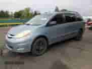 2006 Toyota Sienna XLE with VIN 5TDBA22C26S058027, listed as a Copart auction lot 70231245 with 218,809 mi miles and Non repairable. Bid and sale history available at DreamBid. Image 1.