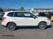 2016 Subaru Forester Touring with VIN JF2SJAXC4GH537026, listed as a IAAI auction lot 43501461 with 66,452 mi miles and . Bid and sale history available at DreamBid. Image 13.