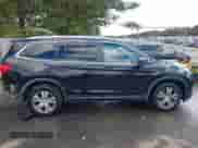 2017 Honda Pilot EX-L with VIN 5FNYF6H70HB006075, listed as a IAAI auction lot 43388253 with 172,698 mi miles and . Bid and sale history available at DreamBid. Image 14.