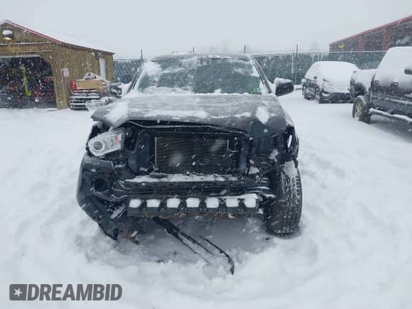 2018 Toyota Tacoma SR with VIN 3TMCZ5AN6JM182800, listed as a IAAI auction lot 41524950 with 63,838 mi miles and . Bid and sale history available at DreamBid. Image 13.