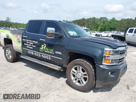2019 Chevrolet Silverado 2500HD High Country z VIN 1GC1KUEY5KF218942, wystawiony jako IAAI lot #42230718 z przebiegiem 170 000 mil mil oraz . Historia ofert i sprzedaży dostępna na DreamBid. Obrazek 1.