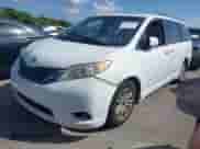 2014 Toyota Sienna XLE with VIN 5TDYK3DC4ES414728, listed as a IAAI auction lot 42885564 with 291,007 mi miles and . Bid and sale history available at DreamBid. Image 2.