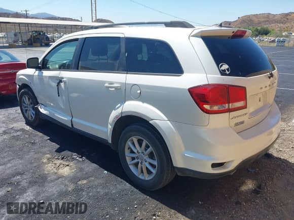 2015 Dodge Journey SXT with VIN 3C4PDCBG9FT612787, listed as a IAAI auction lot 43229852 with 175,392 mi miles and . Bid and sale history available at DreamBid. Image 3.