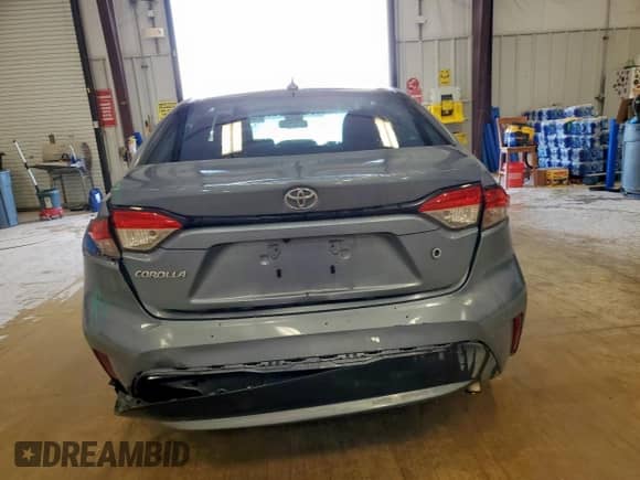 2020 Toyota Corolla L с VIN 5YFDPRAE3LP132465, выставлен на аукционе Copart как лот 70723875 с пробегом 71 401 миль миль и Списание • Salvage title. История ставок и продаж доступна на DreamBid. Изображение 6.