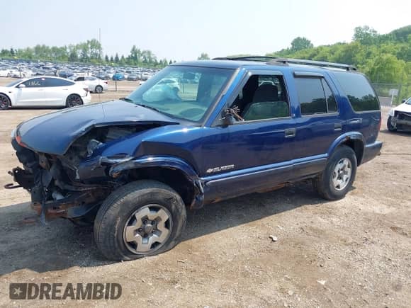 2002 Chevrolet Blazer LS z VIN 1GNDT13W12K197063, wystawiony jako IAAI lot #42436248 z przebiegiem 186 318 mil mil oraz . Historia ofert i sprzedaży dostępna na DreamBid. Obrazek 17.