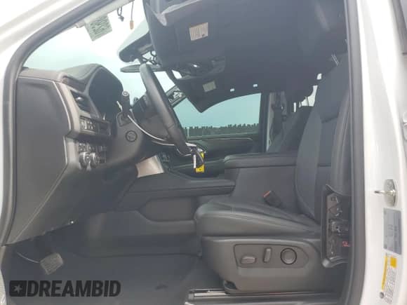 2023 Chevrolet Tahoe LT с VIN 1GNSKNKT0PR552814, выставлен на аукционе Copart как лот 62985055 с пробегом 20 457 миль миль и Списание • Salvage title. История ставок и продаж доступна на DreamBid. Изображение 7.