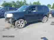 2013 Honda Pilot EX-L with VIN 5FNYF4H65DB060543, listed as a IAAI auction lot 42380911 with 330,452 mi miles and . Bid and sale history available at DreamBid. Image 2.