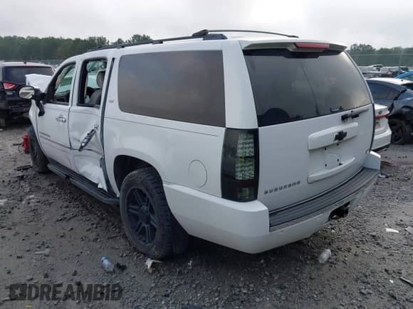 2009 Chevrolet Suburban LTZ z VIN 1GNFK36359R256609, wystawiony jako IAAI lot #42799458 z przebiegiem 146 257 mil mil oraz . Historia ofert i sprzedaży dostępna na DreamBid. Obrazek 3.