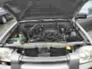 2004 Nissan Frontier XE with VIN 1N6ED29YX4C409431, listed as a Copart auction lot 45340255 with 210,685 mi miles and Salvage title. Bid and sale history available at DreamBid. Image 11.