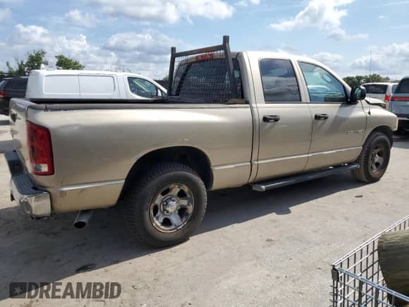2003 Dodge 1500 ST with VIN 1D7HA18D73S271701, listed as a Copart auction lot 66928405 with 184,859 mi miles and Salvage title. Bid and sale history available at DreamBid. Image 3.