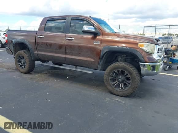 2014 Toyota Tundra 1794 Edition with VIN 5TFGY5F13EX165687, listed as a IAAI auction lot 43294453 with 126,120 mi miles and . Bid and sale history available at DreamBid. Image 1.