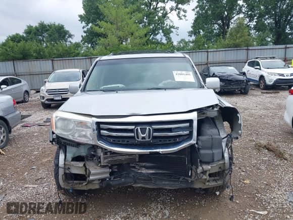 2015 Honda Pilot Touring с VIN 5FNYF4H90FB058793, выставлен на аукционе IAAI как лот 42881495 с пробегом 316 893 миль миль и . История ставок и продаж доступна на DreamBid. Изображение 13.