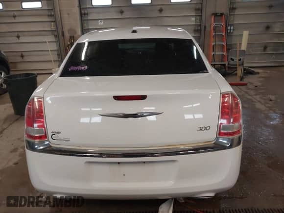 2013 Chrysler 300 with VIN 2C3CCARG6DH505220, listed as a IAAI auction lot 41944437 with 196,548 mi miles and . Bid and sale history available at DreamBid. Image 16.