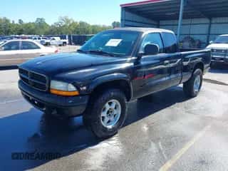 1999 Dodge Dakota SLT z VIN 1B7GG22X3XS172411, wystawiony jako IAAI lot #43433051 z przebiegiem 200 417 mil mil oraz . Historia ofert i sprzedaży dostępna na DreamBid. Obrazek 2.