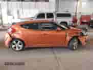 2013 Hyundai Veloster w/Black Int z VIN KMHTC6AD3DU143656, wystawiony jako IAAI lot #42139839 z przebiegiem 121 392 mil mil oraz . Historia ofert i sprzedaży dostępna na DreamBid. Obrazek 13.