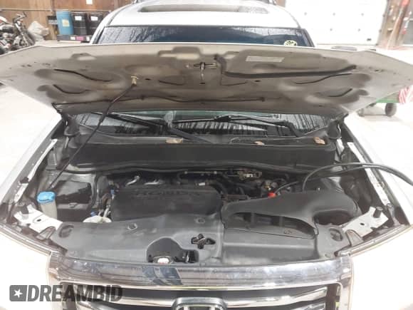 2012 Honda Pilot Touring with VIN 5FNYF4H90CB034523, listed as a IAAI auction lot 43540902 with 269,702 mi miles and . Bid and sale history available at DreamBid. Image 10.