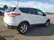 2014 Ford Escape SE с VIN 1FMCU0GX2EUD85934, выставлен на аукционе Copart как лот 82550975 с пробегом 156 384 миль миль и Списание • Salvage title. История ставок и продаж доступна на DreamBid. Изображение 3.
