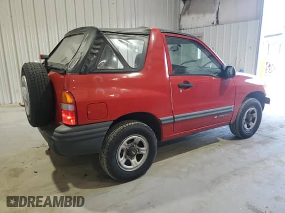 1999 Chevrolet Tracker с VIN 2CNBJ18C1X6908951, выставлен на аукционе Copart как лот 57425005 с пробегом 97 737 миль миль и Списание • Salvage title. История ставок и продаж доступна на DreamBid. Изображение 3.