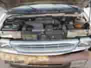 2001 Ford Econoline Cargo z VIN 1FTRE142X1HB27593, wystawiony jako Copart lot #83827154 z przebiegiem 190 761 mil mil oraz Szkoda całkowita • Salvage title. Historia ofert i sprzedaży dostępna na DreamBid. Obrazek 12.