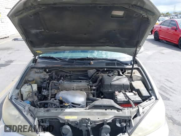 2006 Toyota Camry STD z VIN 4T1BE32K16U156037, wystawiony jako IAAI lot #43193359 z przebiegiem 187 400 mil mil oraz . Historia ofert i sprzedaży dostępna na DreamBid. Obrazek 10.