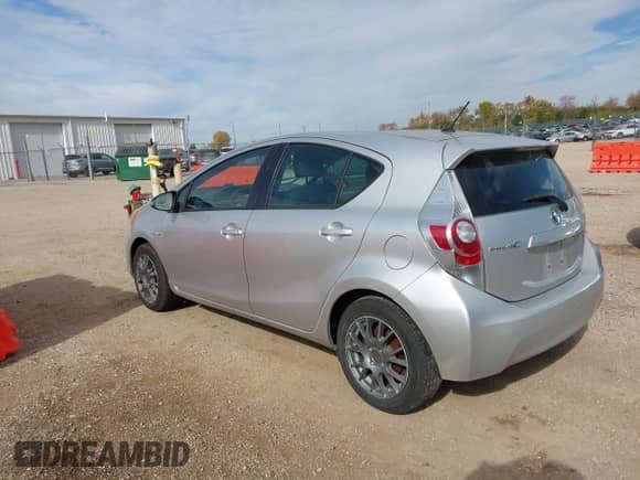 2012 Toyota Prius Two with VIN JTDKDTB36C1502998, listed as a IAAI auction lot 43549279 with 161,653 mi miles and . Bid and sale history available at DreamBid. Image 3.