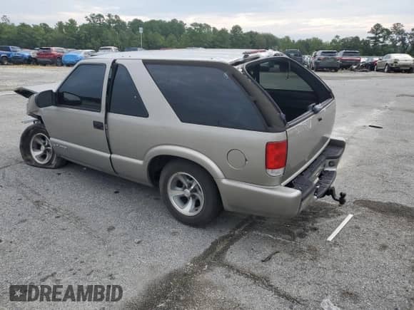 2004 Chevrolet Blazer LS с VIN 1GNCS18X74K157511, выставлен на аукционе Copart как лот 65042754 с пробегом Не указан миль и На запчасти • Non repairable. История ставок и продаж доступна на DreamBid. Изображение 2.