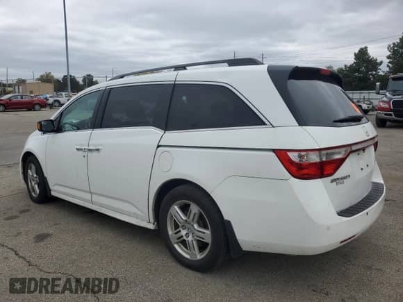 2011 Honda Odyssey Touring с VIN 5FNRL5H99BB088985, выставлен на аукционе Copart как лот 85648105 с пробегом 169 209 миль миль и Списание • Salvage title. История ставок и продаж доступна на DreamBid. Изображение 2.