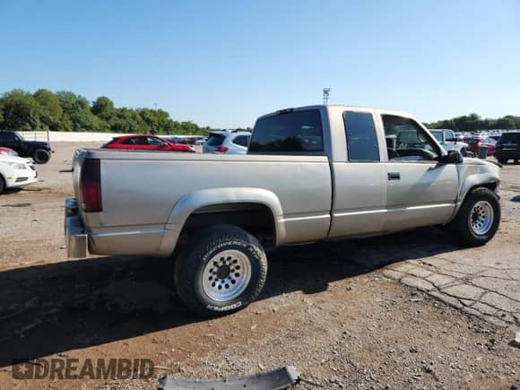 1999 Chevrolet Silverado 2500 with VIN 1GCGK29R4XF051160, listed as a Copart auction lot 67233005 with 226,759 mi miles and Salvage title. Bid and sale history available at DreamBid. Image 3.